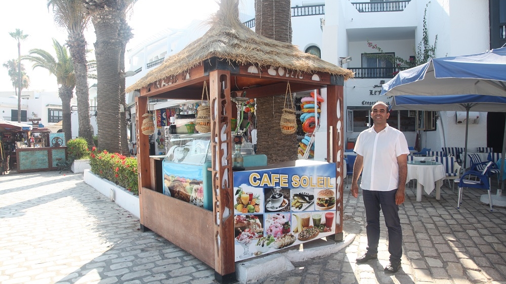 Nawdel Dhifallah, 38, manager of Le Soleil, is afraid his and other businesses will have to close soon [Al Jazeera]