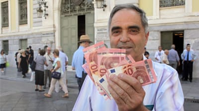 Greek banks have imposed a $66 daily withdrawal limit [  Spyros Tsakiris/  The Associated Press]