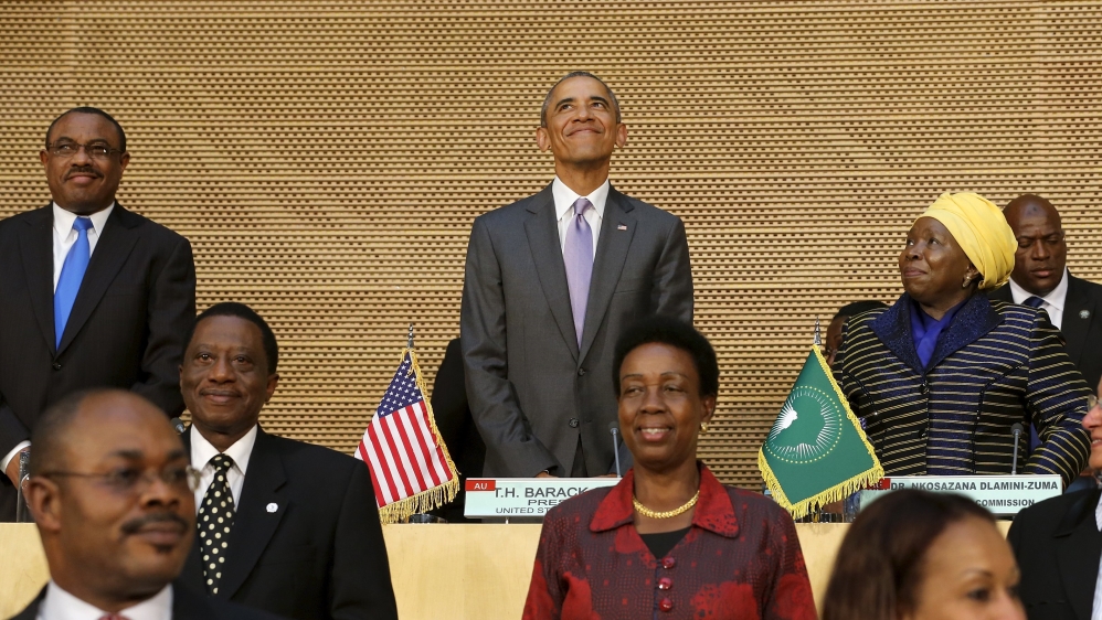 U.S. President Obama, flanked by Ethiopia''s PM Desalegn and African Union Chairperson Dlamini-Zuma, arrives to deliver remarks at the African Union in Addis Ababa