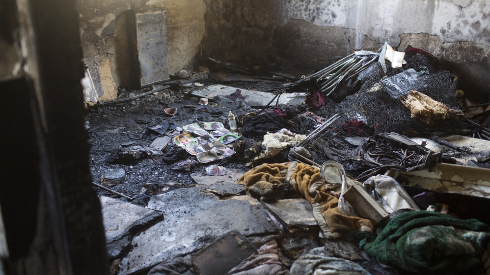 The family's small brick-and-cement home was destroyed by the fire and a Jewish Star of David spray-painted on a wall