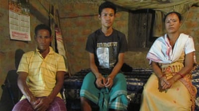 Lakhyamati Daimari, her husband and son were beaten by a mob and banished from their village over witch  accusations [Sarita Santoshini/Al Jazeera]
