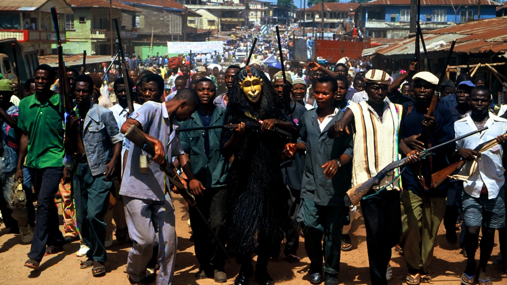 These Komjo rebel fighters in Liberia believed their animist practices protected them from incoming bullets. Sadly, this wasn't true. The mask the rebel fighter in the centre of the picture is wearing is called a 'devil mask'. They had a reputation for being fearsome warriors, and I always felt uncomfortable around them as they could be volatile and unpredictable. 1996 [Jack Picone] 