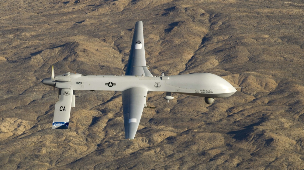 A U.S. Air Force MQ-1 Predator unmanned aerial vehicle flies near the Southern California Logistics Airport in Victorville, California in USAF handout photograph