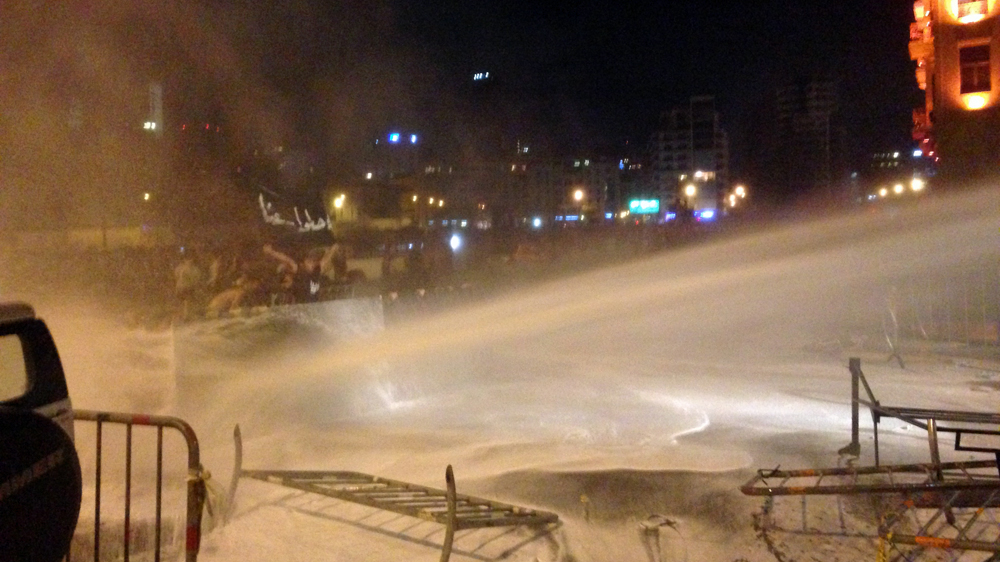 Lebanese security forces used water cannon and fired tear gas on anti-government protesters in the capital Beirut [Nour Samaha/Al Jazeera]