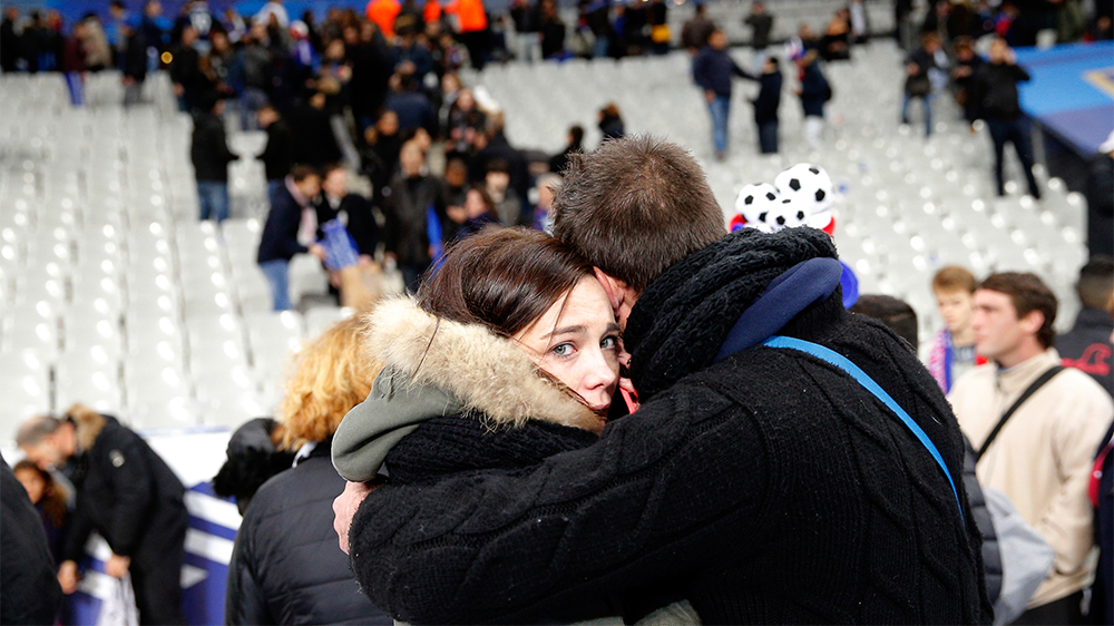 Football fans at the Stade de France after the international friendly match between France and Germany [The Associated Press]