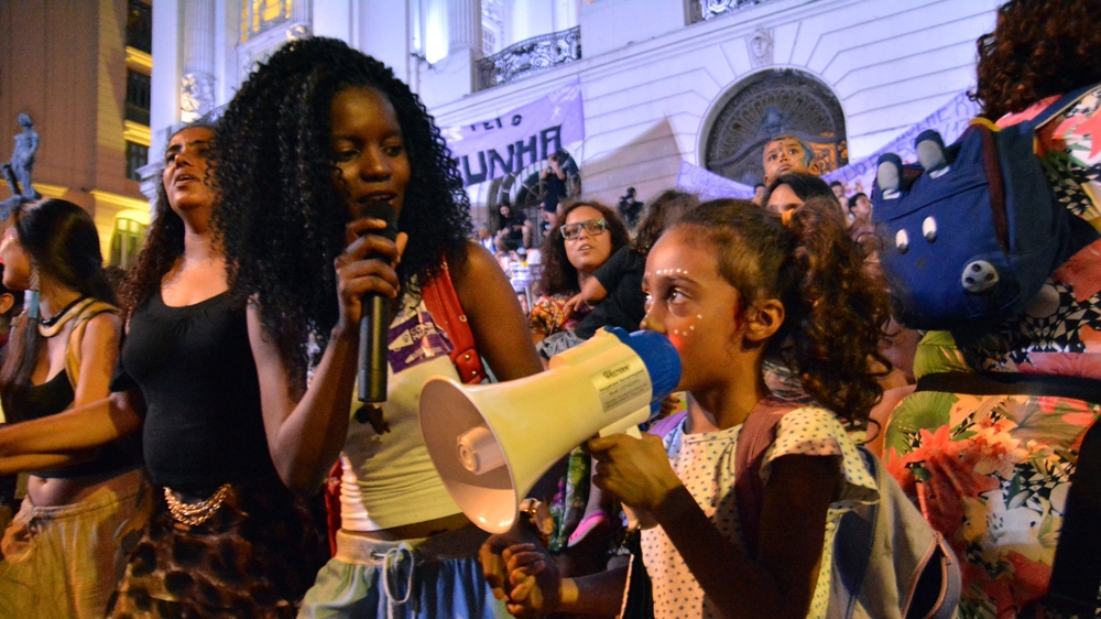 Women protest against proposed changes to the abortion law, which would affect rape victims [Priscilla Moraes/Al Jazeera]