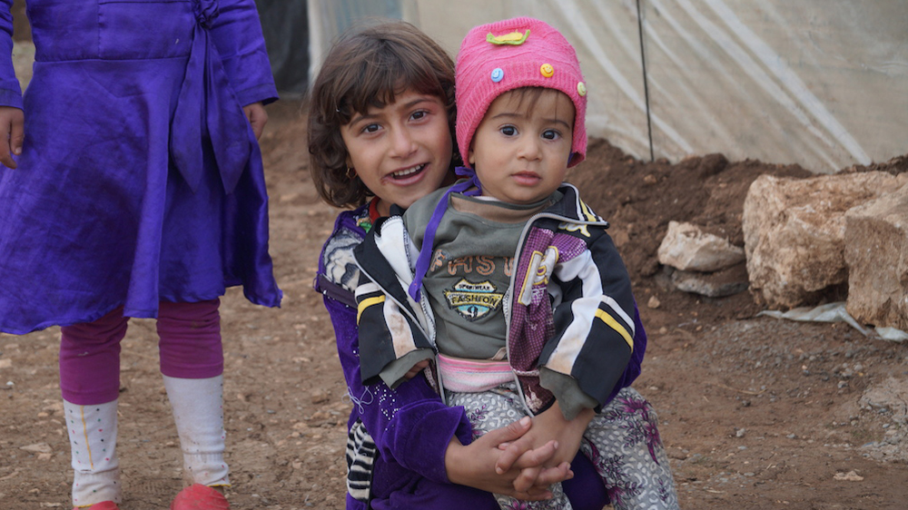 Many civilians are still wary to return to Sinjar, saying they do not trust Peshmerga forces after their withdrawal last year [Wladimir van Wilgenburg/Al Jazeera]