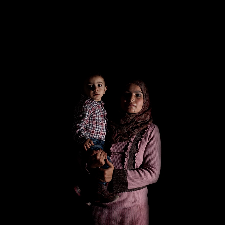 Sana is a Palestinian Refugee from Syria (PRS). She is 22 and came from Damascus in 2013. She lives with her family in a Palestinian camp in Tripoli, north Lebanon. The family lost almost all of their documents when their house in Syria was destroyed. In Lebanon, there are limited services for PRS people. Sana’s son Khaled is now a year old and the family is trying to obtain a birth certificate for him  [Felipe Jacome/Al Jazeera] 