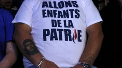 Supporters of French National Front political party leader Marine Le Pen [REUTERS]