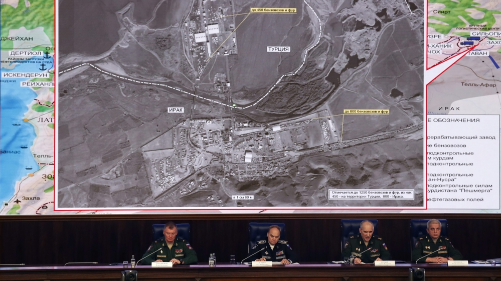 Russian military officials attend a briefing on the fight against terrorism in Syria