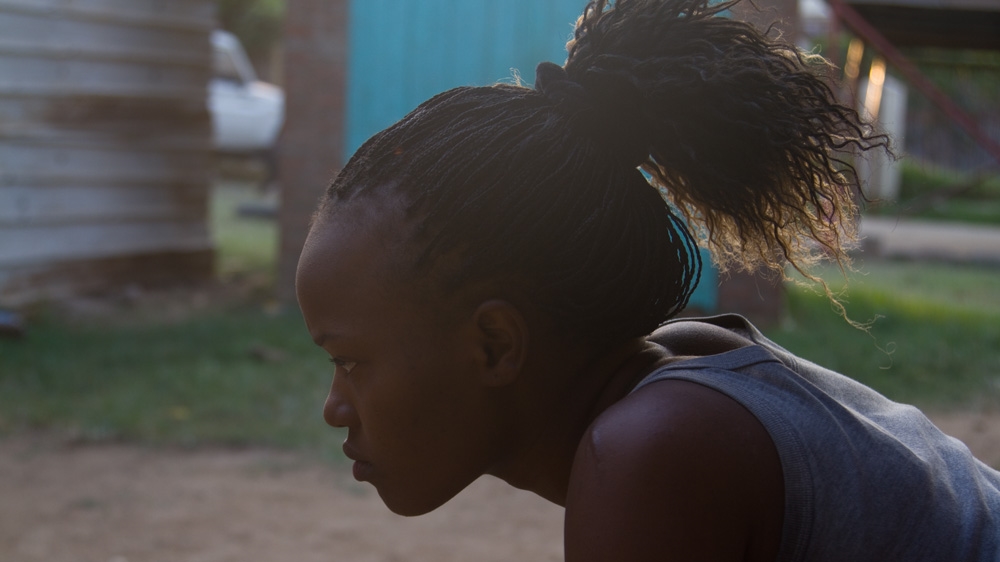 Monica Michael is one of only three girls to participate in the kickboxing programme at the Juba Youth Training Centre [Caitlin McGee/Al Jazeera]