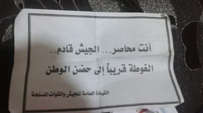 'You are surrounded. The army is coming. The Ghouta will return to the arms of the nation' [Salim al-Shami/Al Jazeera]