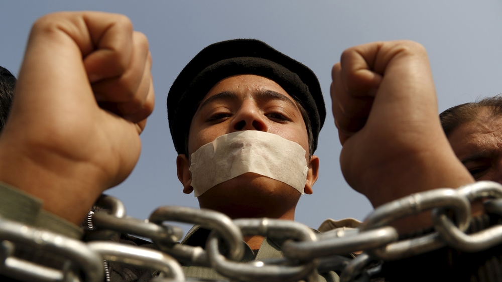 People protest against the attack on Bacha Khan University at a demonstration in Peshawar [Khuram Parvez/Reuters]