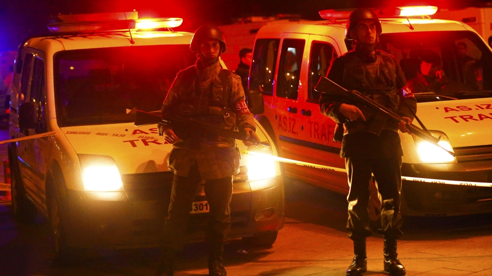 Turkish soldiers stand guard near the site of an explosion in Ankara