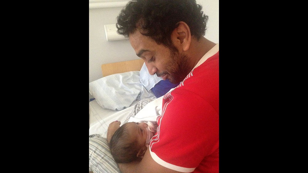 Noor with her father after her open heart surgery [Fatma Naib photo]