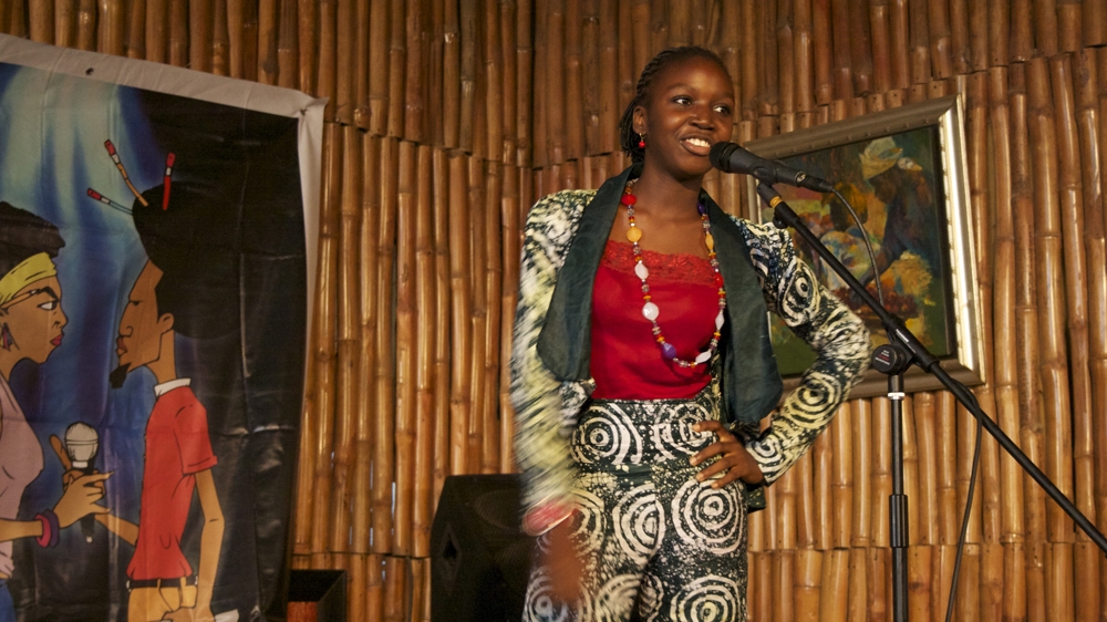 Nigerian poets Wole Soyinka and John Pepper Clark inspire Oyinkansola [Caelainn Hogan/Al Jazeera]    