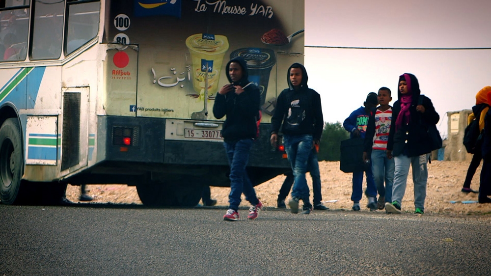 Racism is shrouded in a blanket of denial that rarely permits anyone to see it with clarity, the author explains [Al Jazeera] 