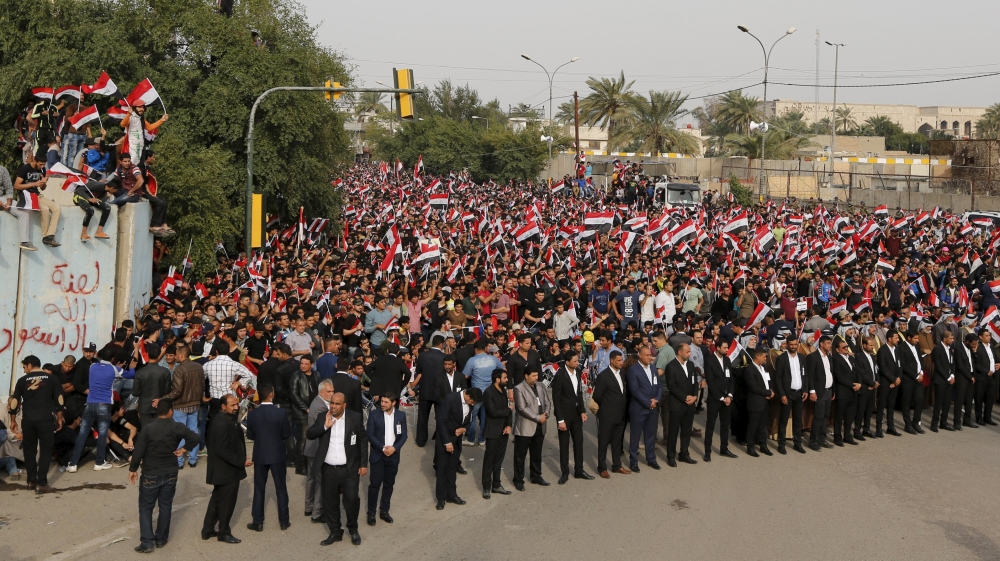 Supporters of prominent Iraqi Shi''ite cleric Moqtada al-Sadr shout slogans during a protest against government corruption outside the Green Zone in Baghdad