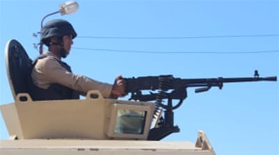 An Egyptian soldier at a checkpoint in Al Arish city, in the troubled northern part of the Sinai peninsula [Reuters]