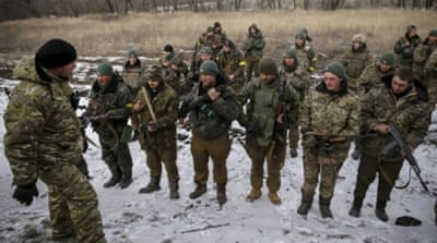 Ukrainian servicemen who fought in Debaltseve are seen near Artemivsk, Ukraine [Reuters]