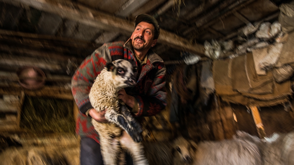 Sorin Boboc was born and raised in Holbav. He says he has never had electricity in his home [Felix Gaedtke/Al Jazeera] 