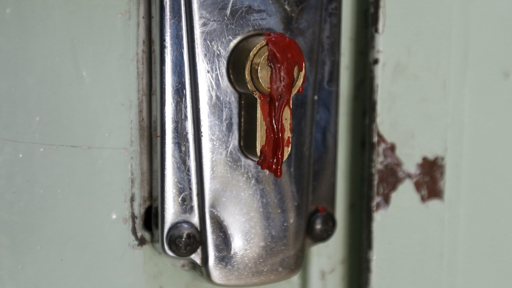 Wax covers the keyhole at the main entrance of the Muslim Brotherhood''s office in Amman