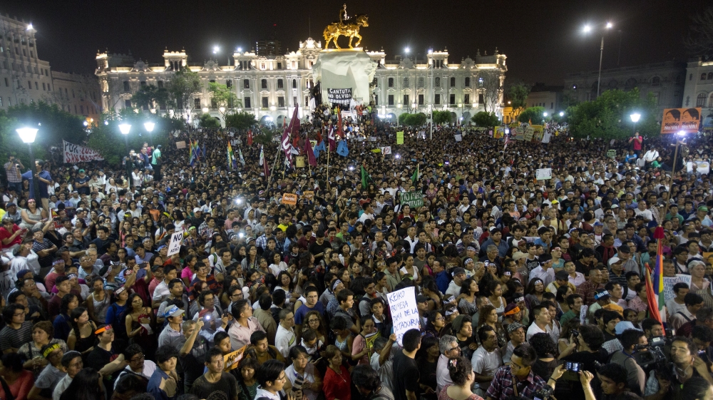 Demonstrators take part in a protest against presidential candidate Keiko Fujimori