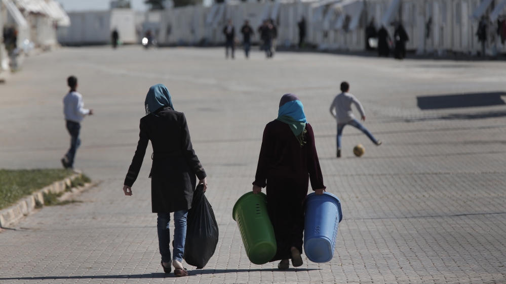 Syrian refugees go about their normal lives at the Oncupinar refugee camp