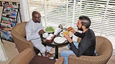 From professionals to diplomats and other expatriates, people are flocking to coffee shops around Abuja [Constance C Ikokwu/Al Jazeera]