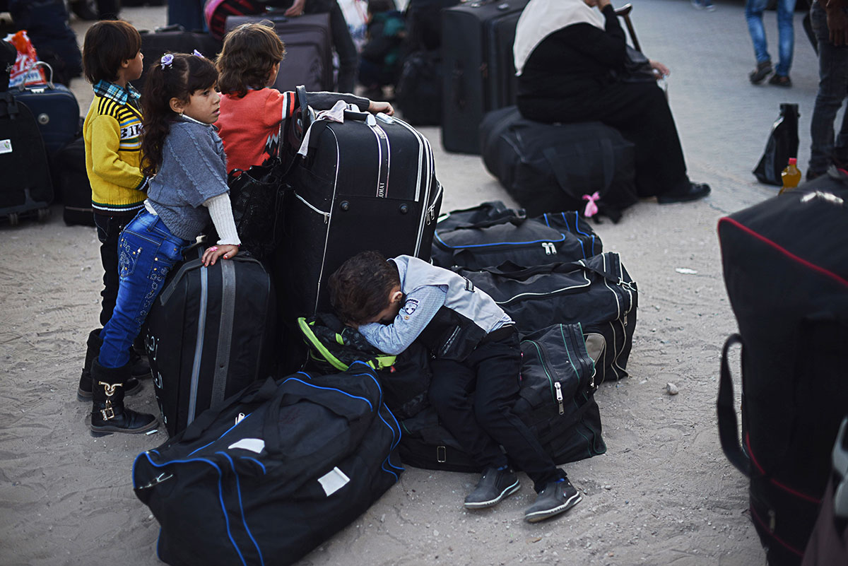 Palestinians wait at the Rafah border/ Please Do Not Use