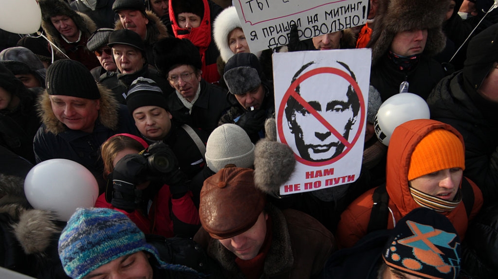 In 2012, opposition activists turned out in temperatures as low as -20C to protest against a third Putin presidency before elections. Many HIV activists and independent experts say Russia's HIV crisis has been fuelled by the Kremlin's abandonment of internationally accepted prevention methods [Getty Images] 