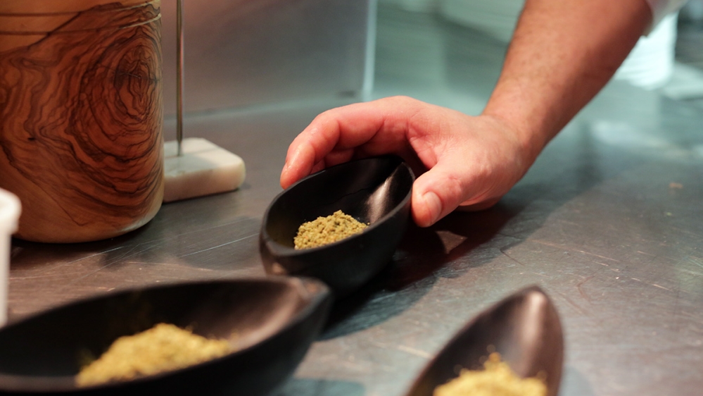 Za'atar , a   mix of thyme and other spices well-known in Syria and Lebanon, made it on to the tables of L'Ami Jean in Paris [Micah Garen/Al Jazeera]