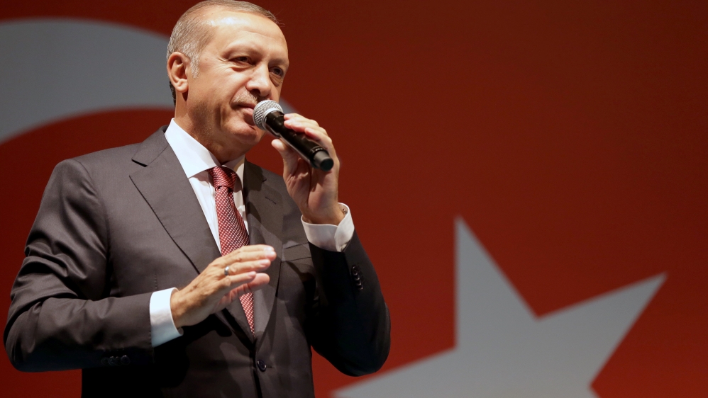 Handout photo of Turkish President Erdogan addressing his supporters outside of his residence in Istanbul