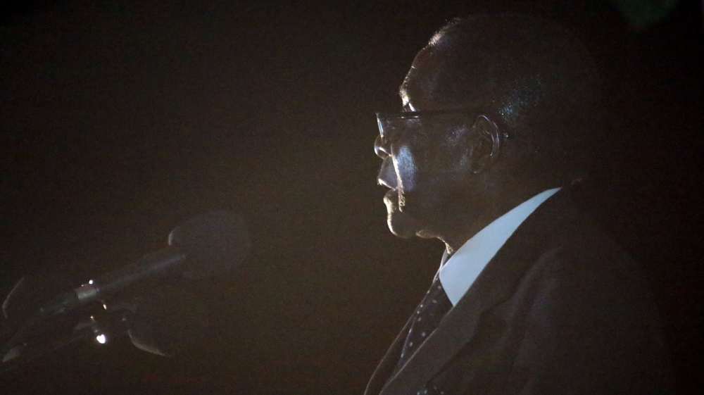 Zanu PF supporters attend a rally by Robert Mugabe