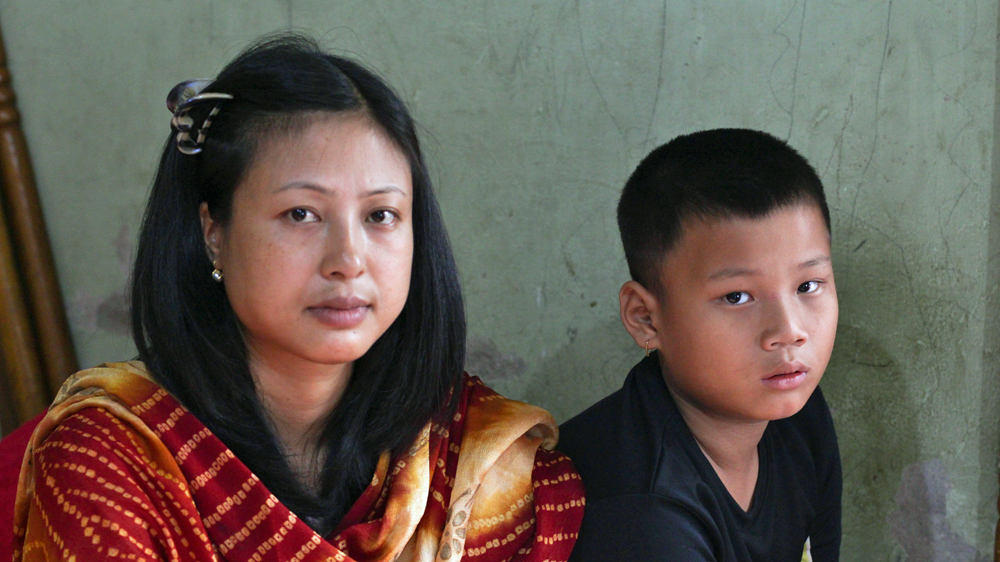 Neena Ningombam is raising two children on her own after her husband was killed [Neha Tara Mehta/Al Jazeera]