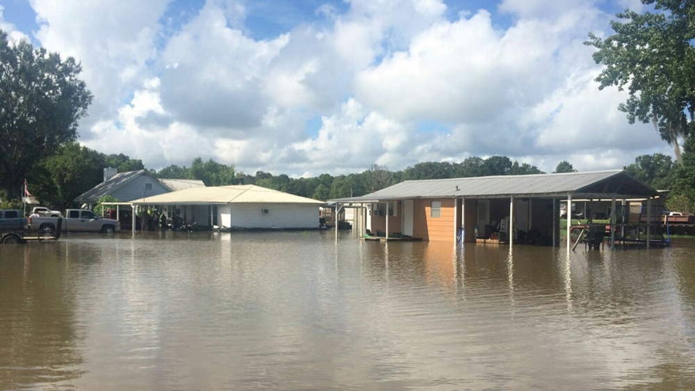 Officials say at least 20,000 have been rescued [Karim Haddad/Al Jazeera] 