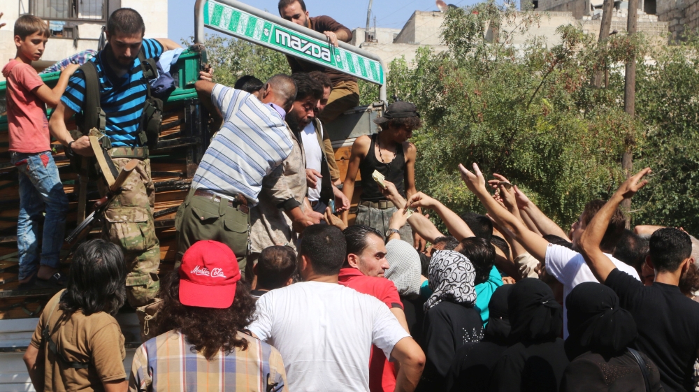 Lorries carrying food were reportedly unable to enter Aleppo on Thursday because of intense bombardment [Abdalrhman Ismail/Reuters]