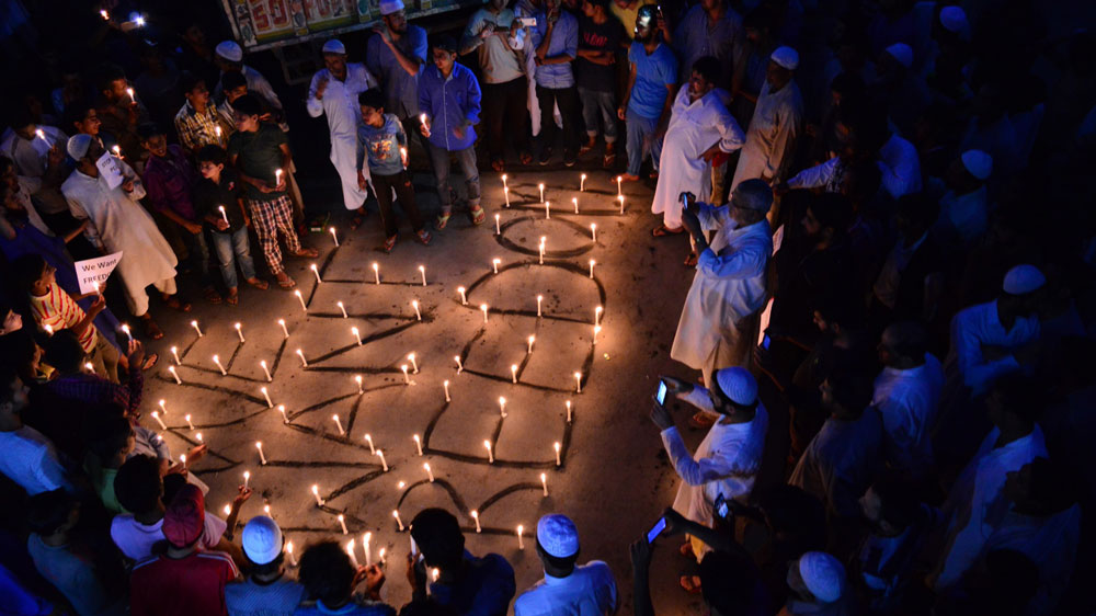 Many areas in Kashmir are still under curfew, though some locals refuse to stay indoors.  Night vigils take place in Sopore in northern Kashmir [Eeshan Peer/  Al Jazeera]