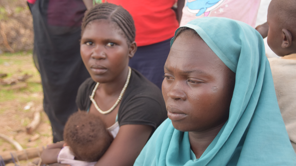Mothers displaced by the SAF assault on the village of Al Azarak [Al Jazeera]