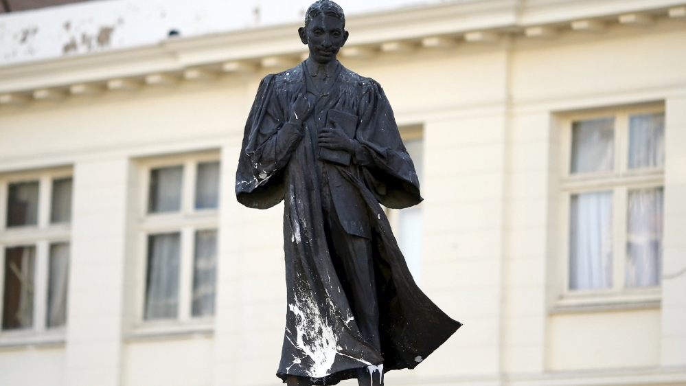 A statue of Gandhi after it was splashed with white paint in Johannesburg, South Africa, in April last year [Siphiwe Sibeko/Reuters]