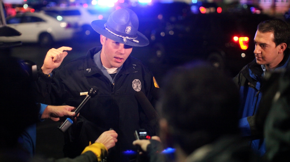 Washington State Trooper Francis speaks to the media at the Cascade Mall following reports of an active shooter in Burlington