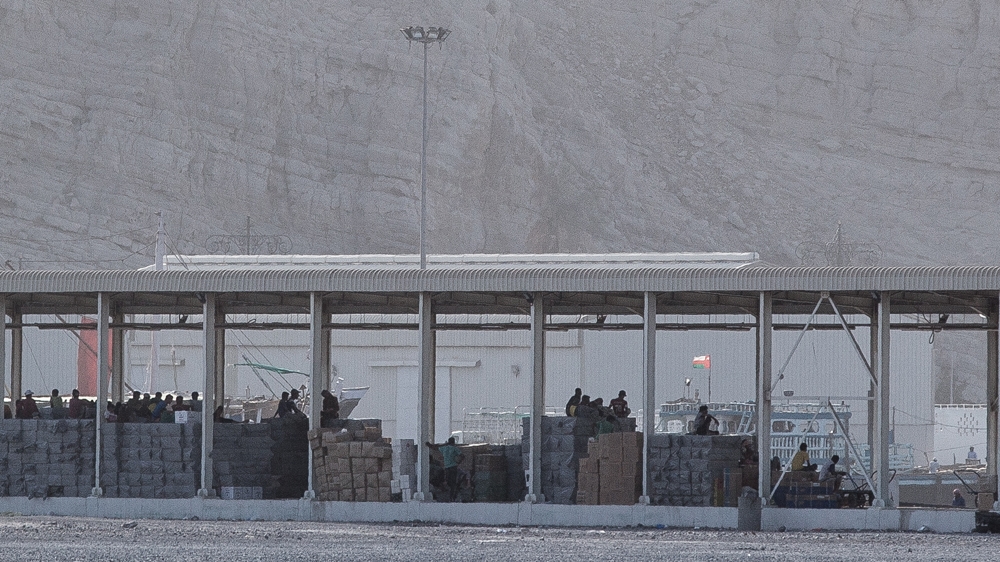 'Smugglers quay' at  Khasab, Oman, on July 21st, 2016. Everyday, dozens of Iranian speedboats arrive to pick up products coming from the UAE [Sebastian Castelier/Al Jazeera]