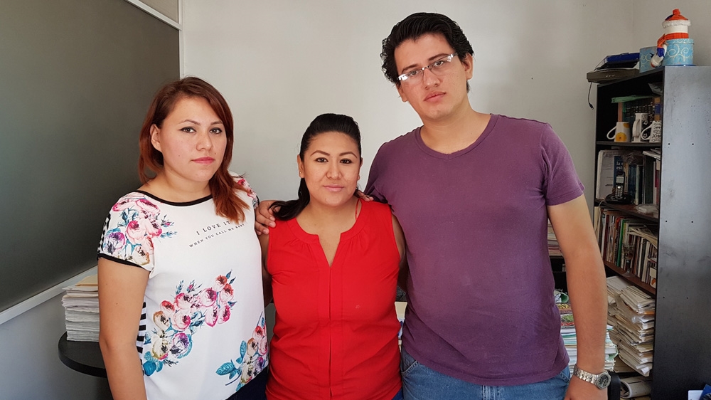Rocio Cruz, Livier Castro and Joel Vargas began campaigning for peace in Colima after their friend Alma Hernandez was murdered in April.  [Duncan Tucker/Al Jazeera] 