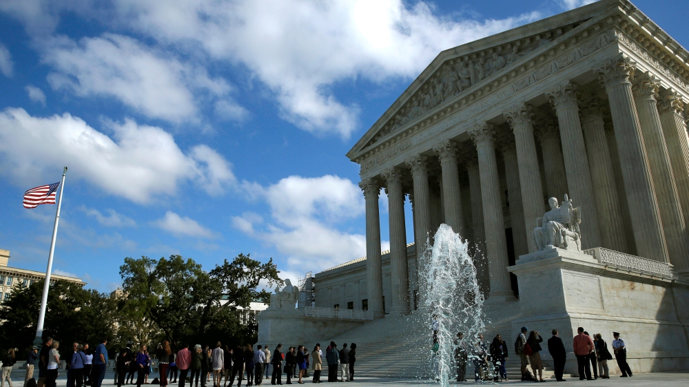 Visitors enter the U.S. Supreme Court in Washington