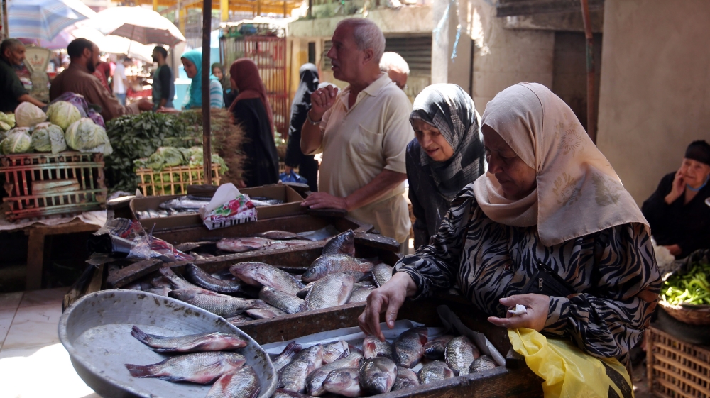 Egyptians shop at a vegetables market in Cairo, Egypt [EPA]