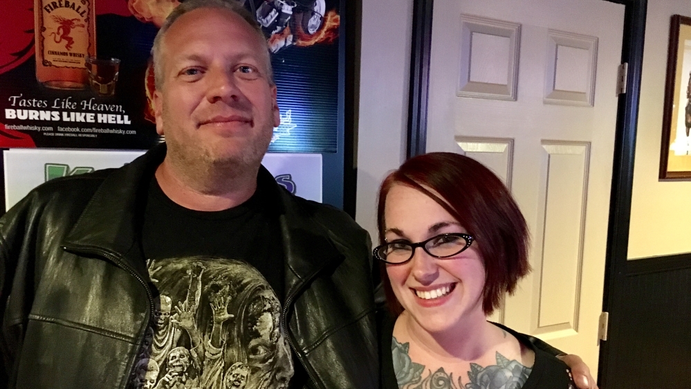 While Comer, right, weighs a third-party vote, co-worker Rob Kolb is not sure he will vote at all [Cajsa Wikstrom/Al Jazeera]