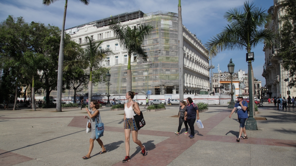 Projects like the restoration of the Manzana de Gomez into a luxury hotel are part of the Cuba's ambitious efforts to accommodate large numbers of tourists [Ed Augustin/Al Jazeera]