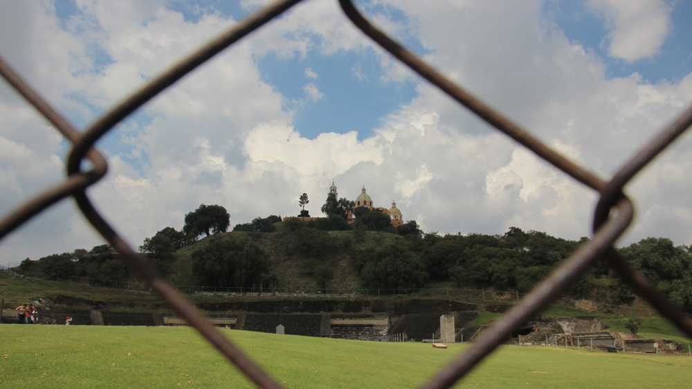 The Great Pyramid of Cholula has only been partially excavated, and for years, was thought to be a natural hill [Ryan Mallett-Outtrim/Al Jazeera]  