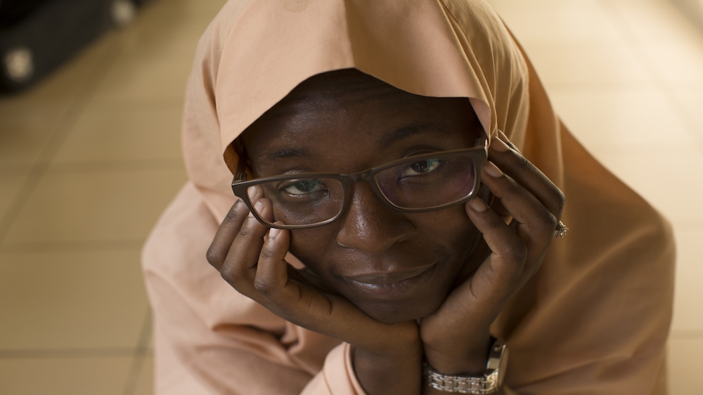 At different stages in her life, Azeenarh Mohammed has worn the hijab and the niqab. Now, she mainly keeps her hair uncovered [Chika Oduah/Al Jazeera] 