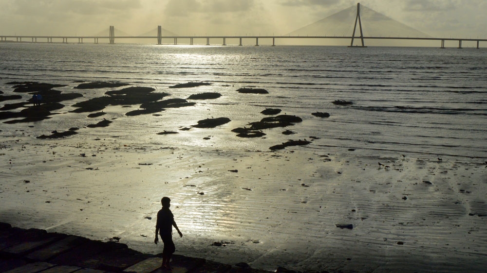 Fishermen say a major bridge over the Arabian Sea has adversely affected the livelihood of their community [Dilnaz Boga/Al Jazeera]